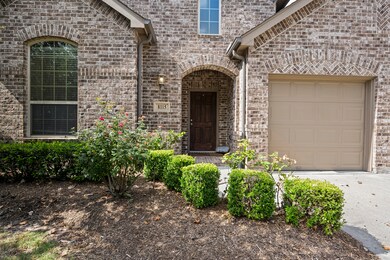 Covered entryway welcomes you into this home.