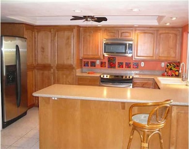 Another picture of the pretty kitchen.  Notice upd