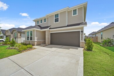 2-car garage with long driveway.