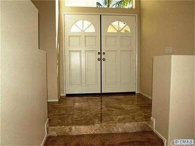 Double Door Entry with Marble Tile