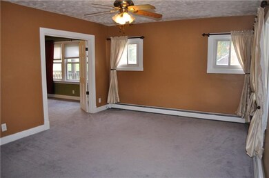 Living Room w/Lighted Ceiling Fan
