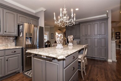 Upgraded cabinets, new range vent hood, new drawers including trash drawer with double baskets to segregate trash & recycling items.