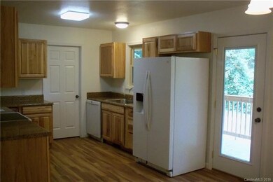 More of Spacious Kitchen & Back Door to Porch