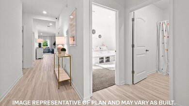 Hall with light hardwood / wood-style flooring