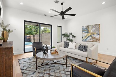 Living room featuring recessed lighting, light wo