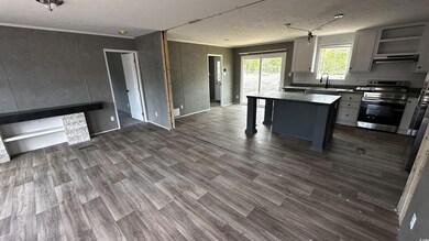 Kitchen with a kitchen breakfast bar, stainless st