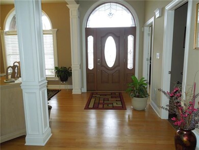 Entry.  Gorgeous hardwood flooring that invites yo