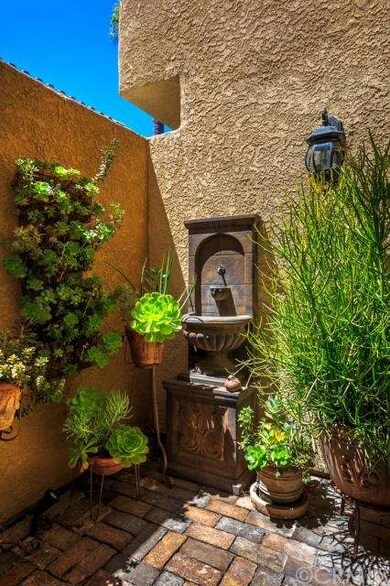 Enjoy the atrium with it's trickling fountain and 
