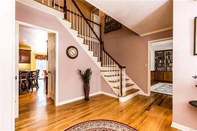 Open grand foyer w/plenty of space and coat closet