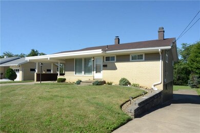 Driveway on right side of house.  Covered car port