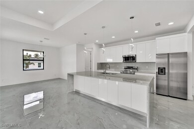 Kitchen featuring stainless steel appliances, mode