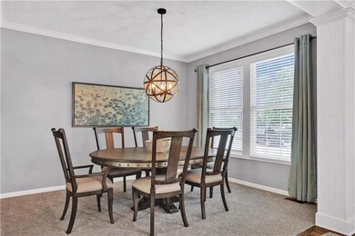 Dining room with new carpet and light fixture