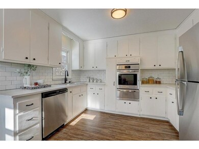 Kitchen features classic subway tile backsplash, s