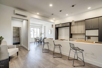 Kitchen, half bath and dining room