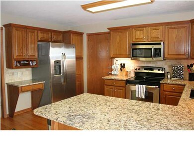 Kitchen features new granite countertops, a new ti