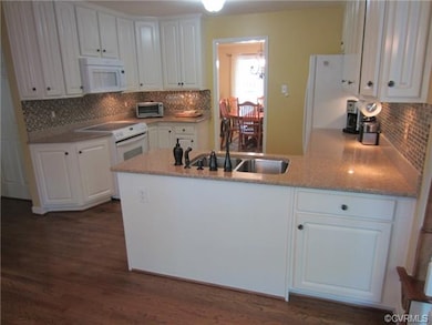 Charming Renovated Kitchen Accented with Handsome 