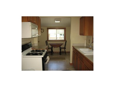 ADDL VIEW OF KITCHEN TO EATING AREA