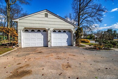 Two car side entry garage with openers.