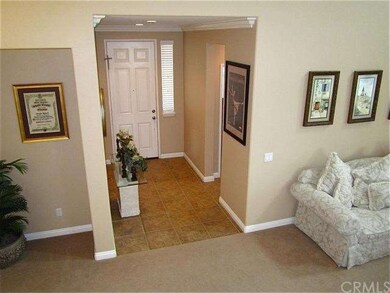 To the right of the entry is a bedroom (ideal as a