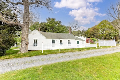 East facade (fence is lot line)