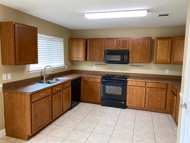 Kitchen area next to Living room