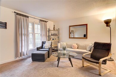 Two big front windows offering lots of natural light