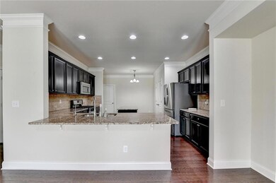 Kitchen featuring appliances with stainless steel 