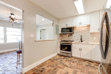 Kitchen with Brick Floors