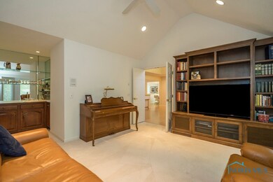 Den with Entertainment Center & Wet Bar