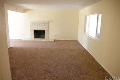 Great room with new paint, fireplace, carpet, and 