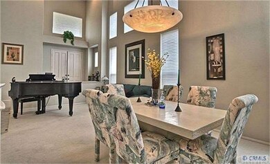 Living and Dining Area feature soaring 30' ceiling