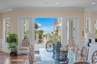 Dining room with ornamental molding, a wealth of n