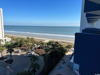 View of water feature featuring a beach view