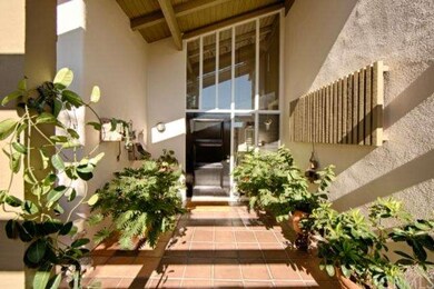 View toward front door from entry patio.