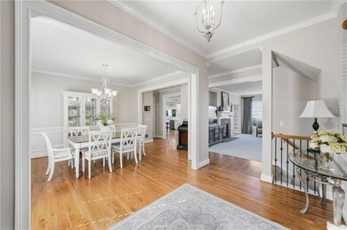 Inviting foyer with views into dining area & family room