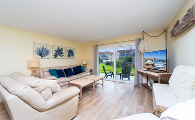 Living area featuring light wood-style flooring