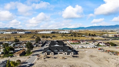 Aerial view of residential area featuring mountains