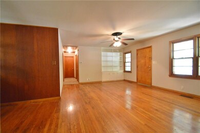 Living room.  Original wood flooring.