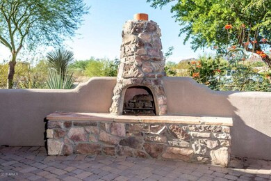COURTYARD STACKED STONE COZY FIREPLACE