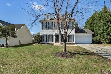 This beauty awaits you- two car garage, fenced in 
