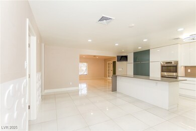 Dining Area. Laundry room to left. Kitchen to righ