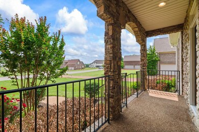This wonderful front porch is just perfect for drinking your morning coffee!