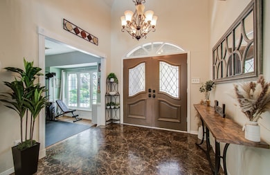 2-story height entrance with marble floors