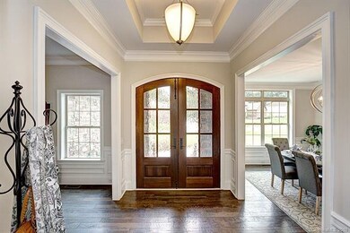 Elegant foyer with trey ceiling, beautiful mahogan