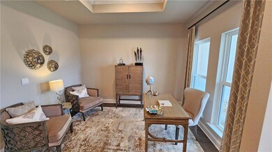 Sitting room with wood-type flooring, a wealth of 