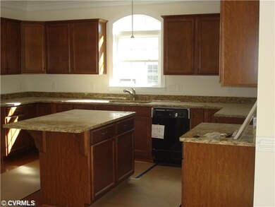 Kitchen - Warm Maple Cabinets with granite counter
