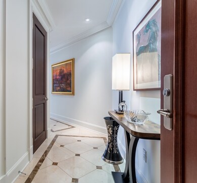 The entry has perfect art wall & a coat closet.