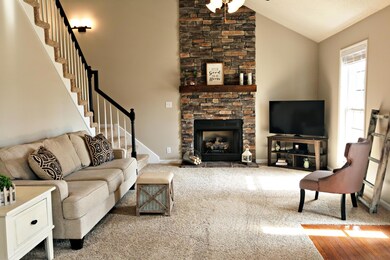 Large great room with vaulted ceiling.