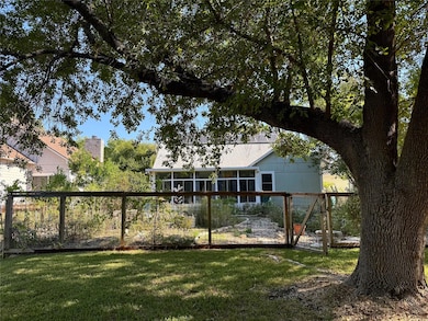 Back of house featuring a gate