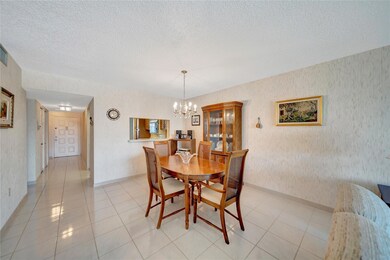 Dining Room with Pass-Through to Kitchen; Front Do